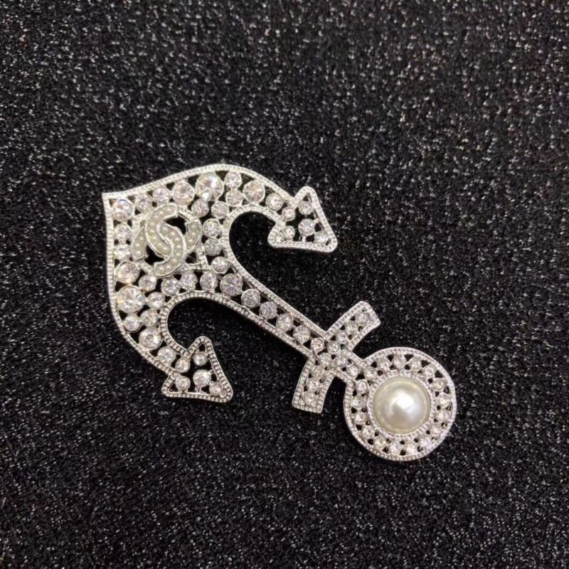 Ch*el brooches